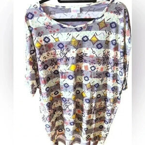 Lularoe Large Ivory Irma tunic top. Geometric‎ pattern over a blue stripe. NWT.